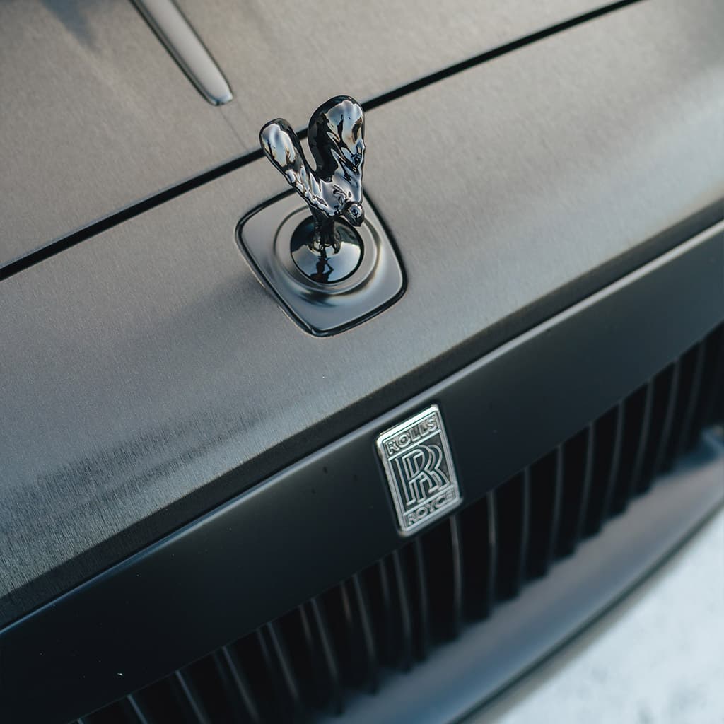 Rolls-Royce Spirit of Ecstasy on a black badge bonnet
